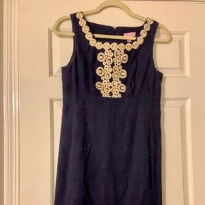 Navy dress with gold detail